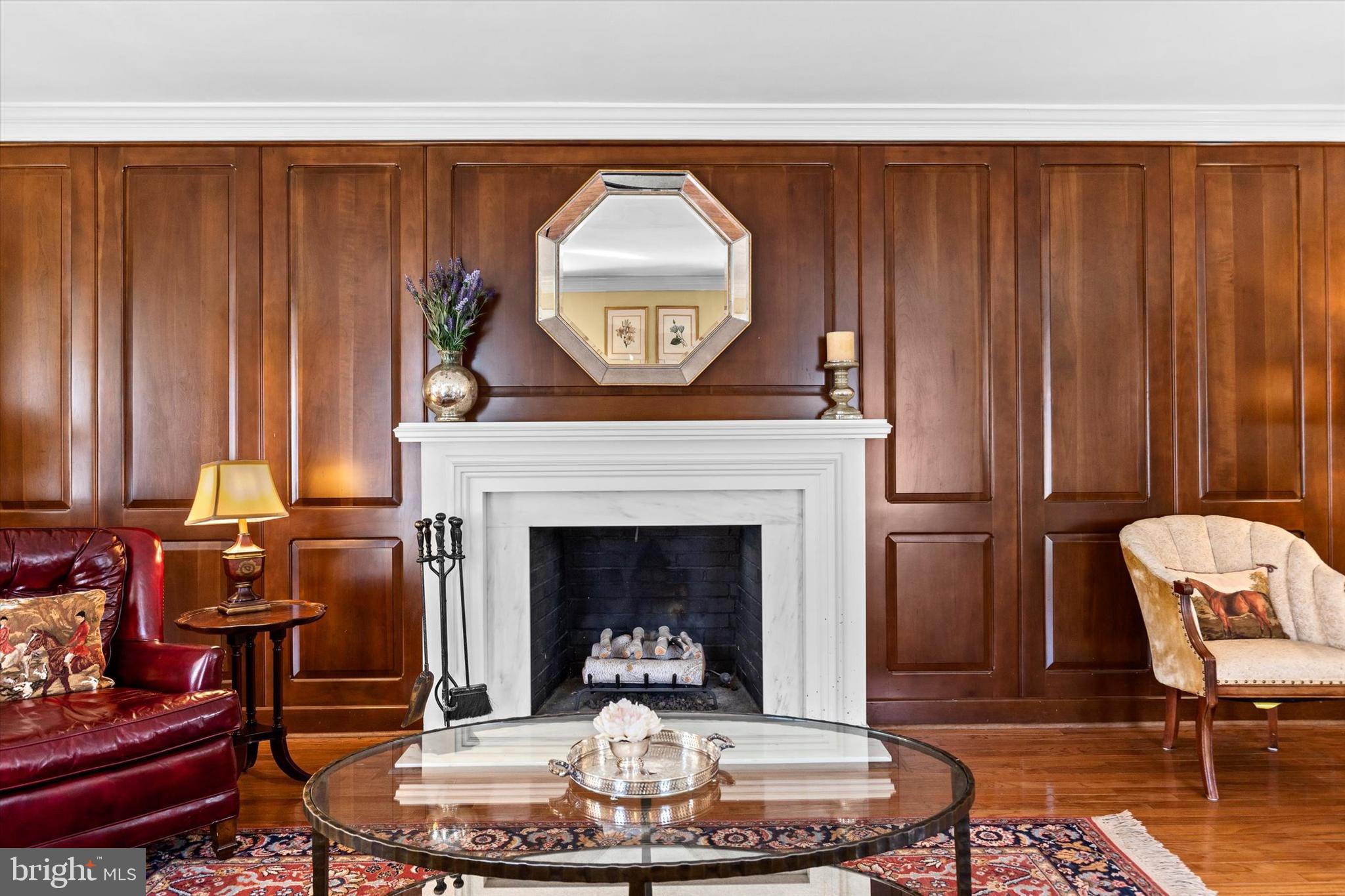 1979 Alcott Road York, PA 17402 - Photo 28 of 115 a living room with furniture a fireplace and a table