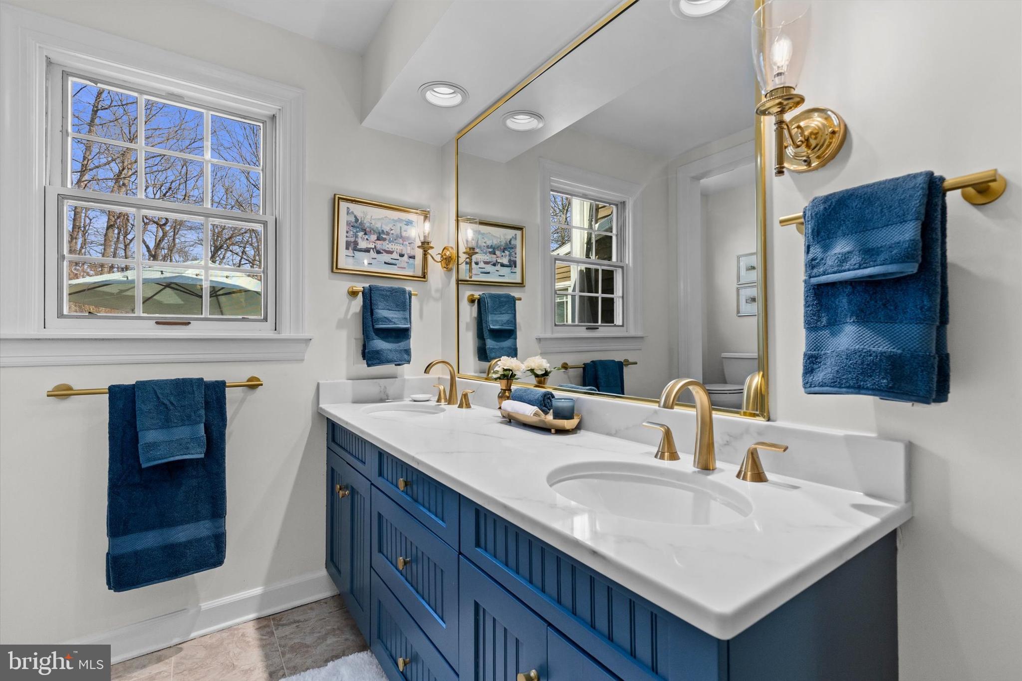 1979 Alcott Road York, PA 17402 - Photo 34 of 115 a bathroom with a sink double vanity and a mirror