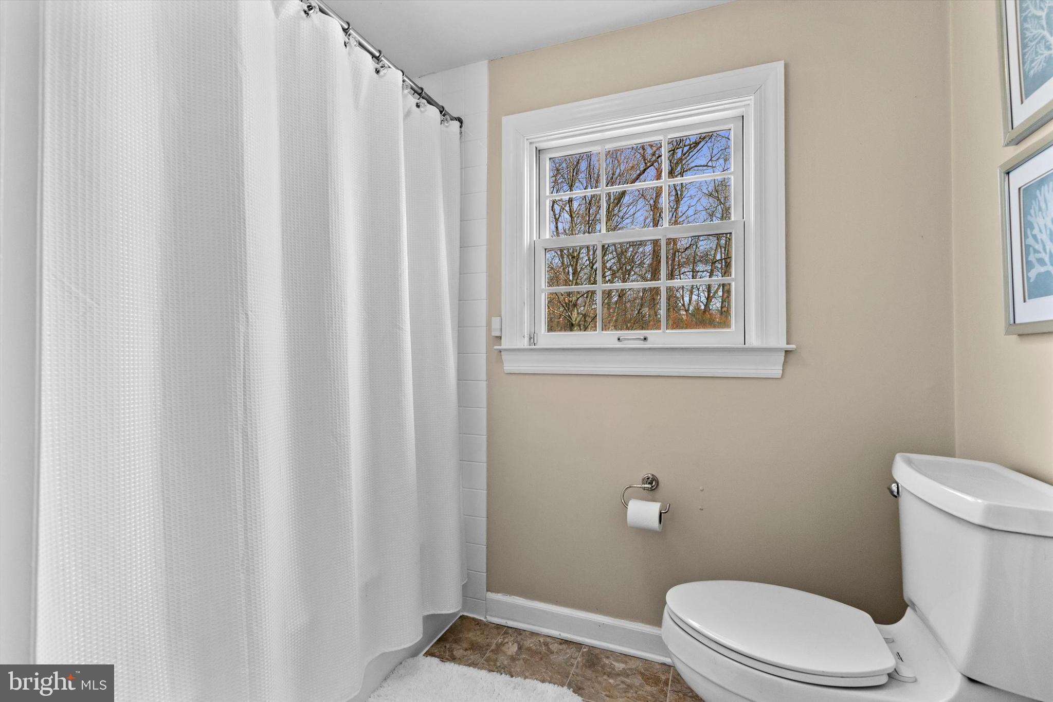 1979 Alcott Road York, PA 17402 - Photo 45 of 115 a white toilet sitting next to a window