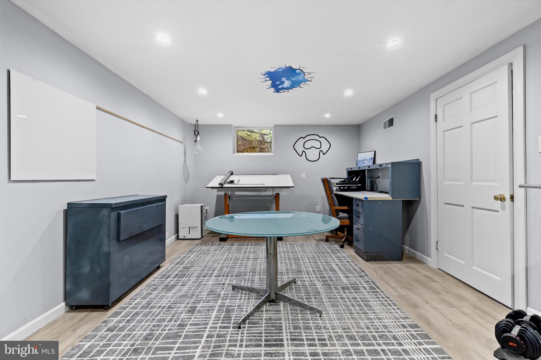 1979 Alcott Road York, PA 17402 - Photo 53 of 115 a living room with furniture a flat screen tv and kitchen view