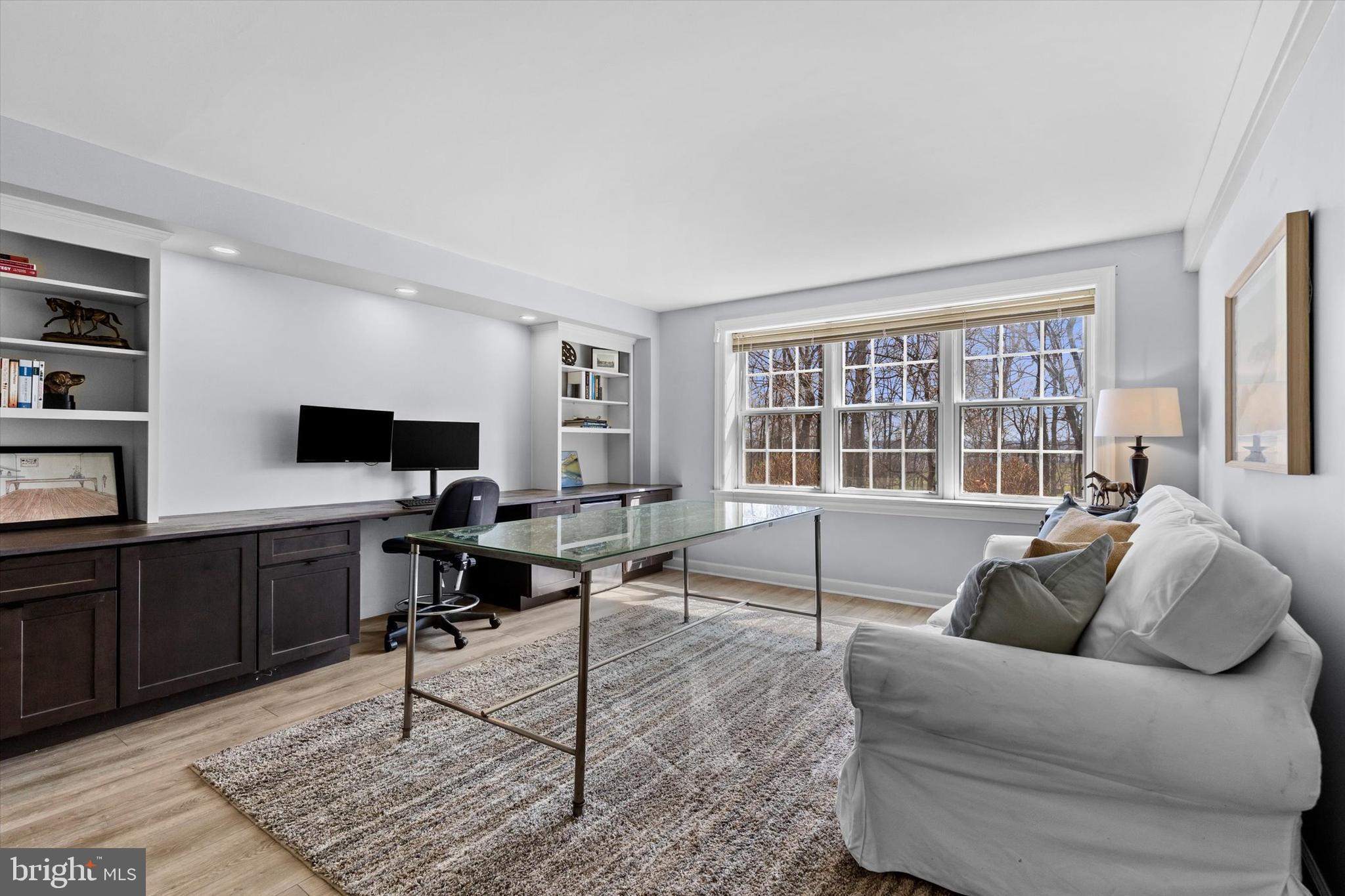 1979 Alcott Road York, PA 17402 - Photo 54 of 115 a living room with furniture a flat screen tv and windows