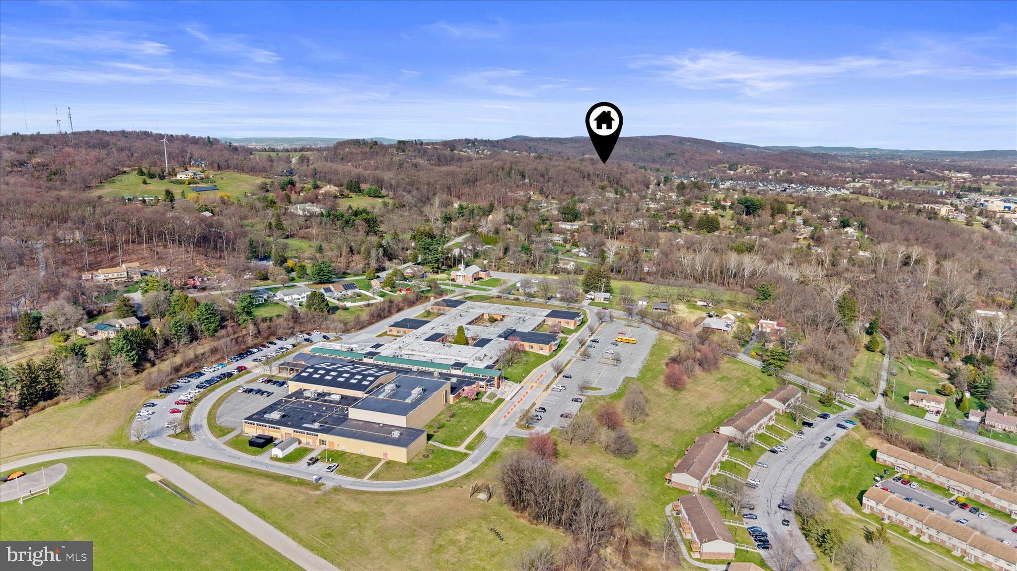 1979 Alcott Road York, PA 17402 - Photo 66 of 115 an aerial view of a swimming pool and mountain view