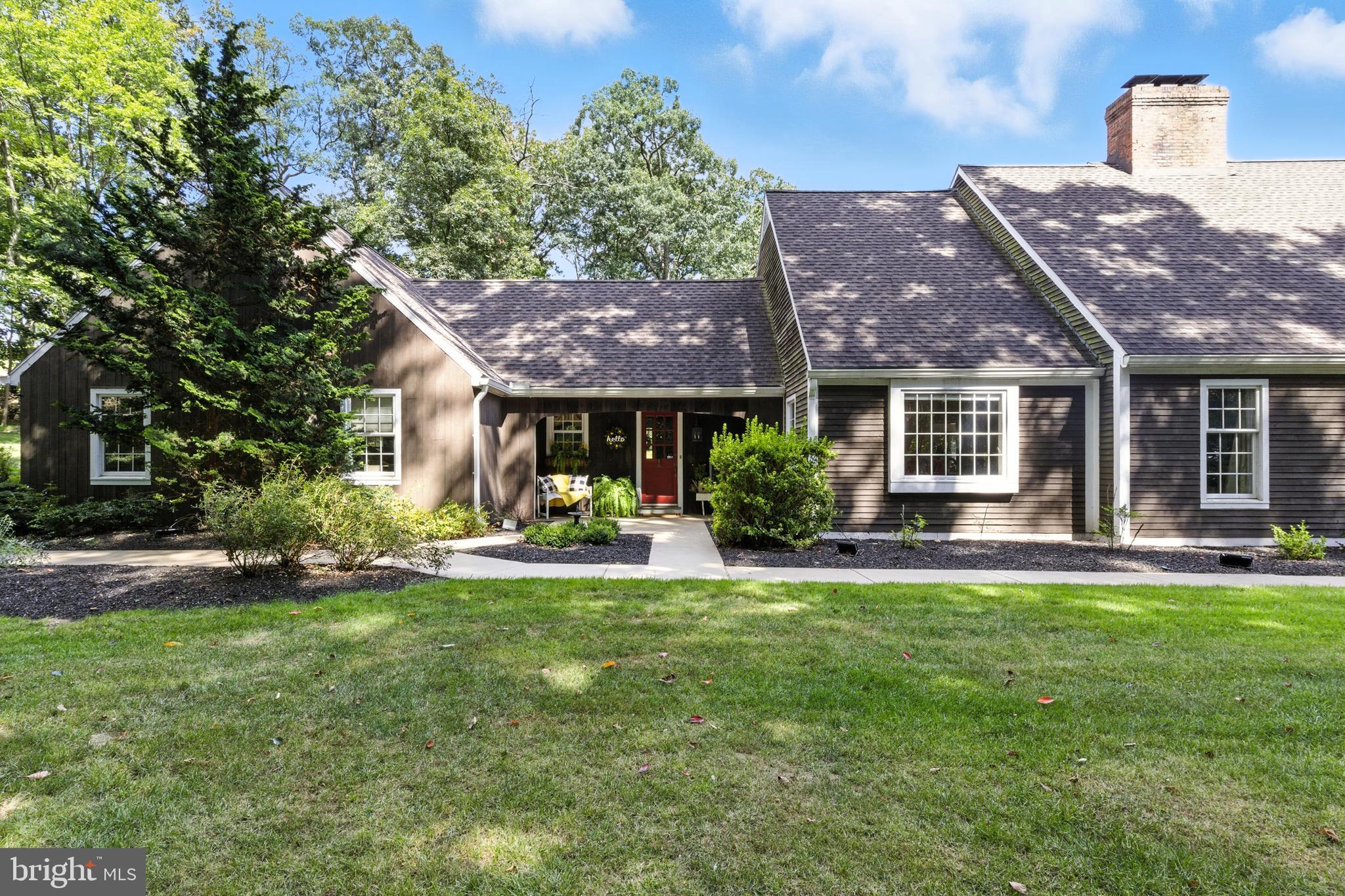 1979 Alcott Road York, PA 17402 - Photo 71 of 115 a front view of a house with a yard table and chairs