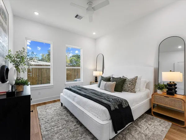 a bathroom with a double vanity sink a mirror and a