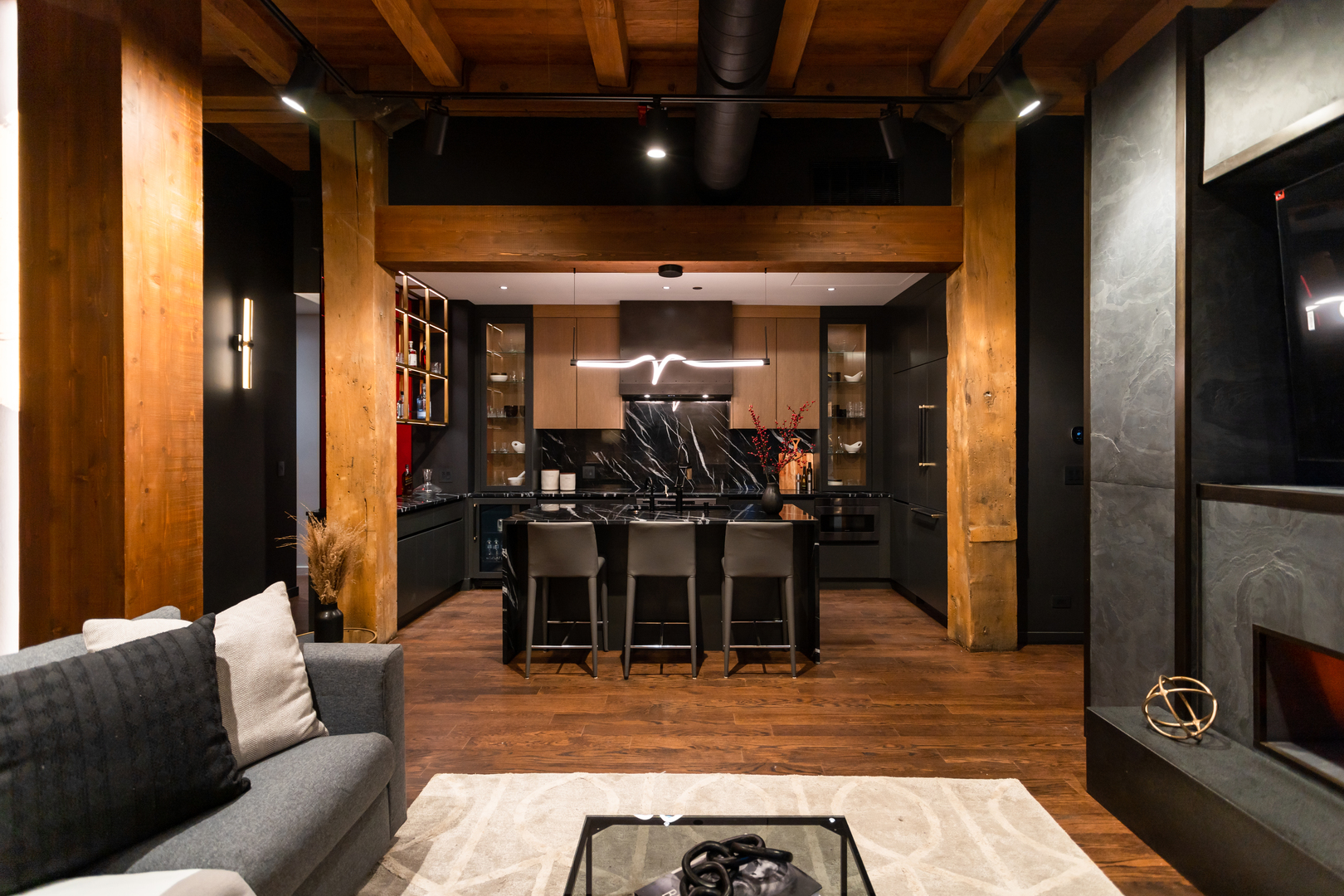 1101 West Lake Street, Unit 3D Chicago, IL 60607 - Photo 17 of 48 a living room with furniture a flat screen tv and a table