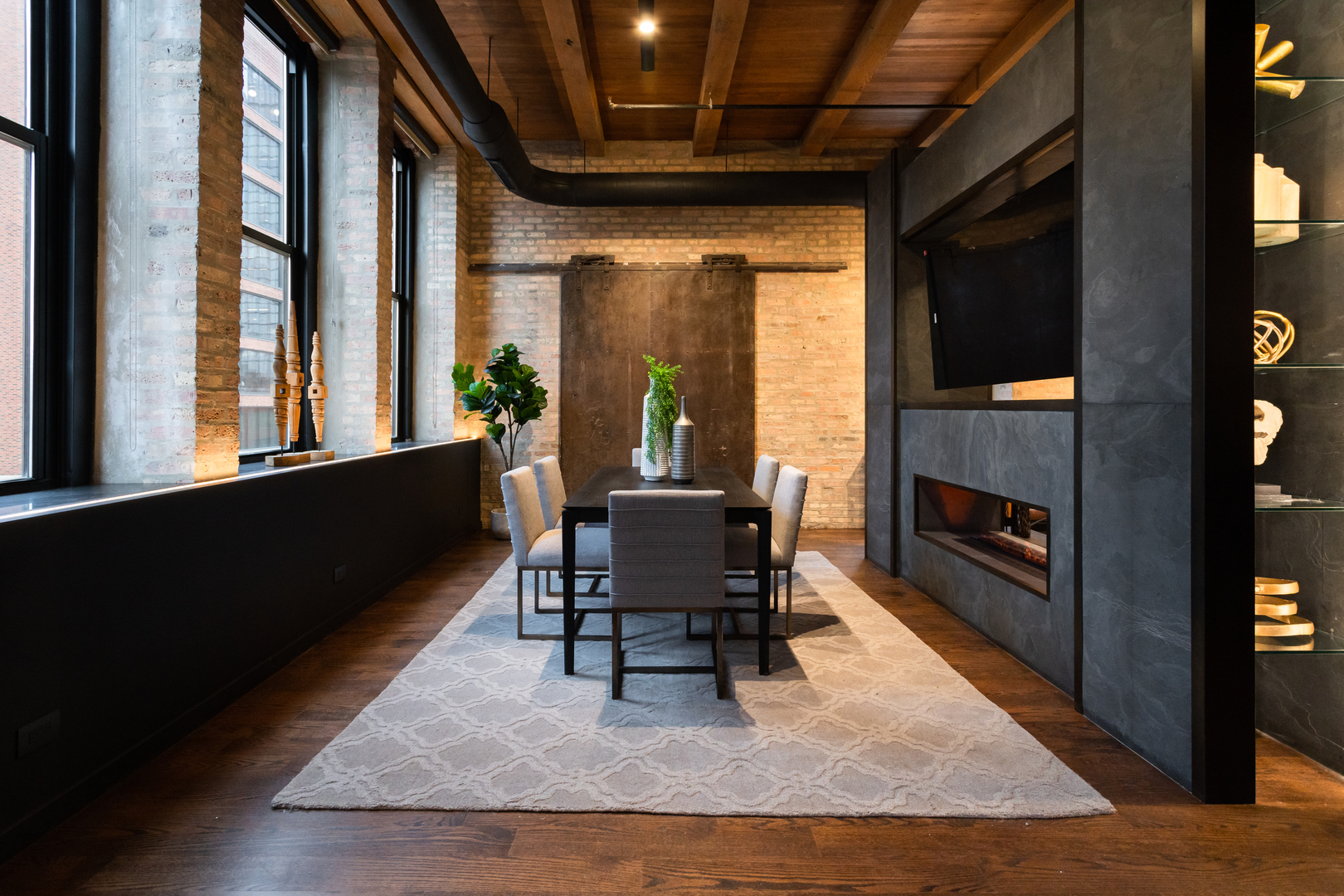 1101 West Lake Street, Unit 3D Chicago, IL 60607 - Photo 27 of 48 a living room with furniture and a fireplace