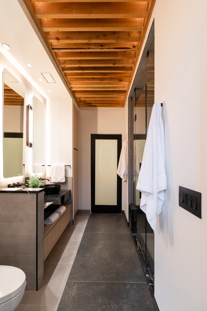 1101 West Lake Street, Unit 3D Chicago, IL 60607 - Photo 38 of 48 a bathroom with a sink a toilet and a shower