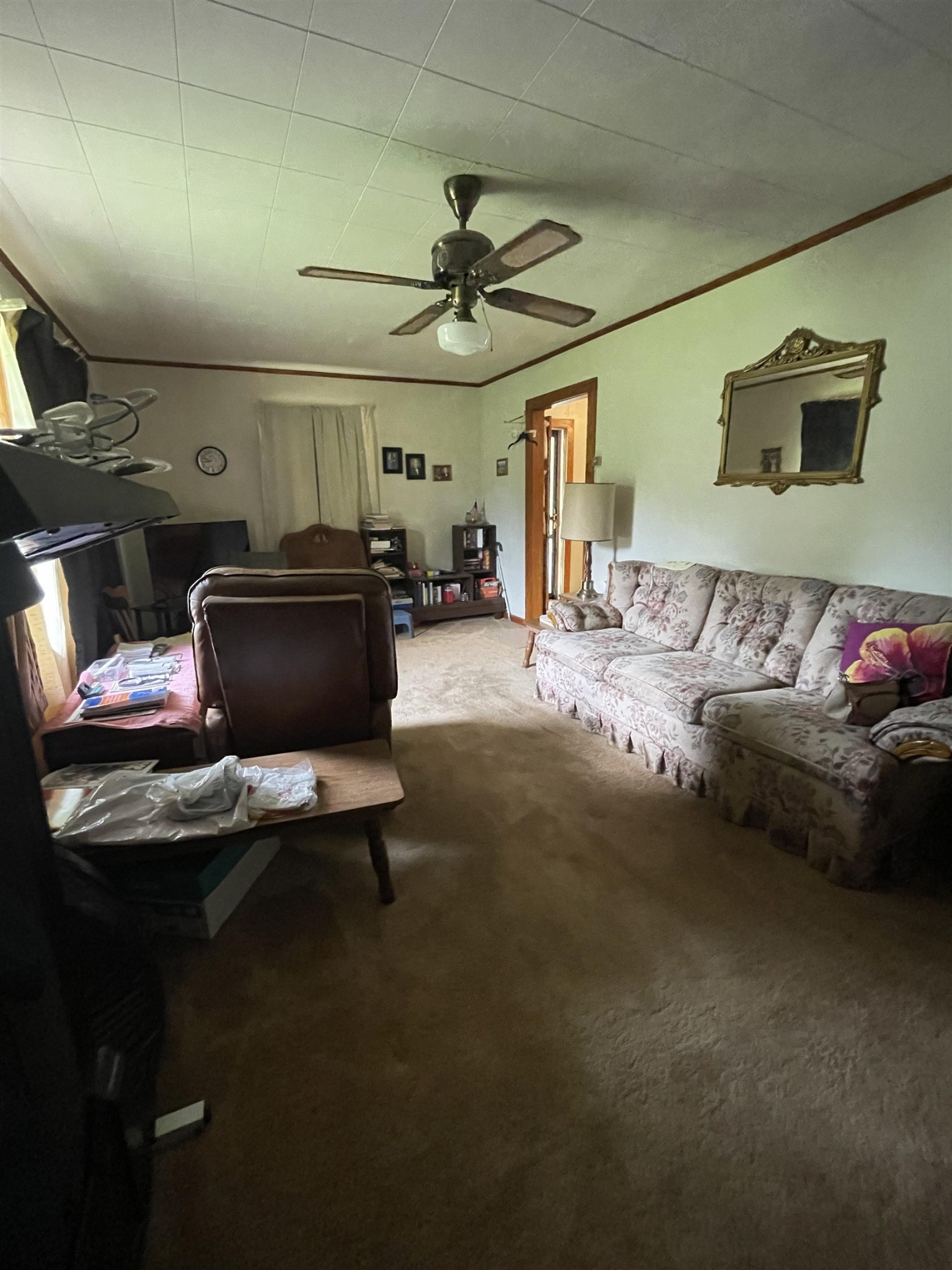 961 Highway 57 Ramer, TN 38367 - Photo 4 of 9 a living room with furniture and a flat screen tv