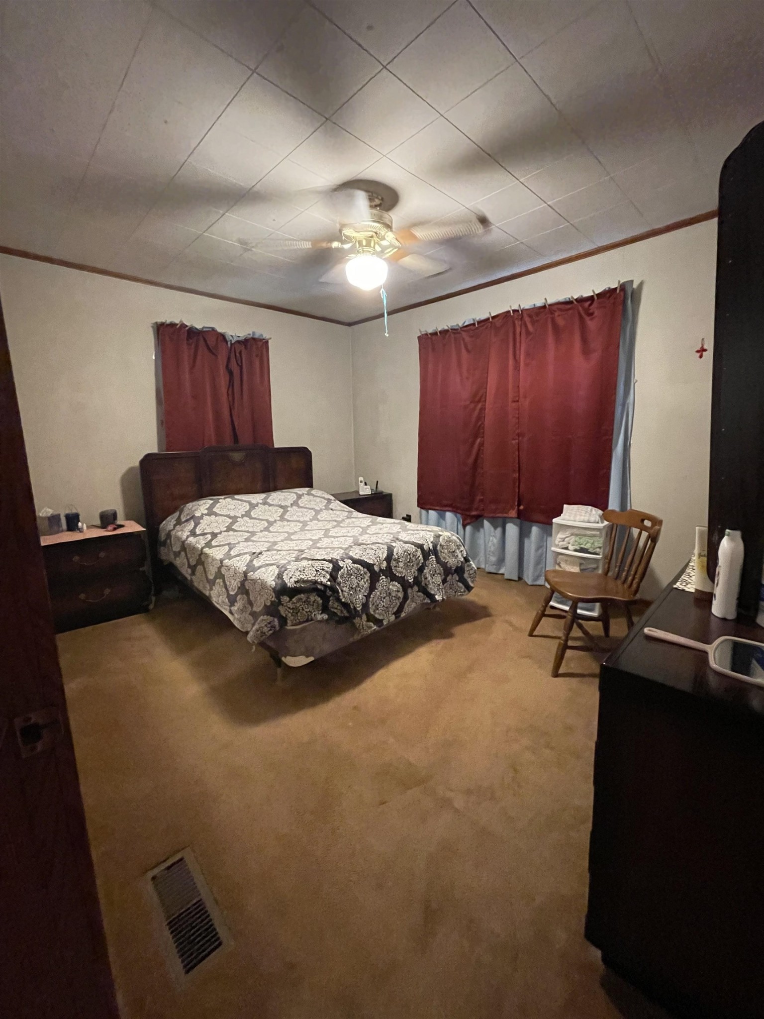 961 Highway 57 Ramer, TN 38367 - Photo 6 of 9 a bed room with a bed and a chair
