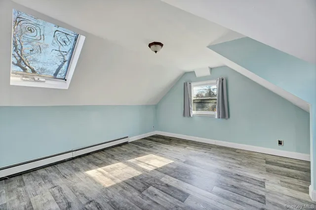 a kitchen with stainless steel appliances granite countertop a stove and cabinets