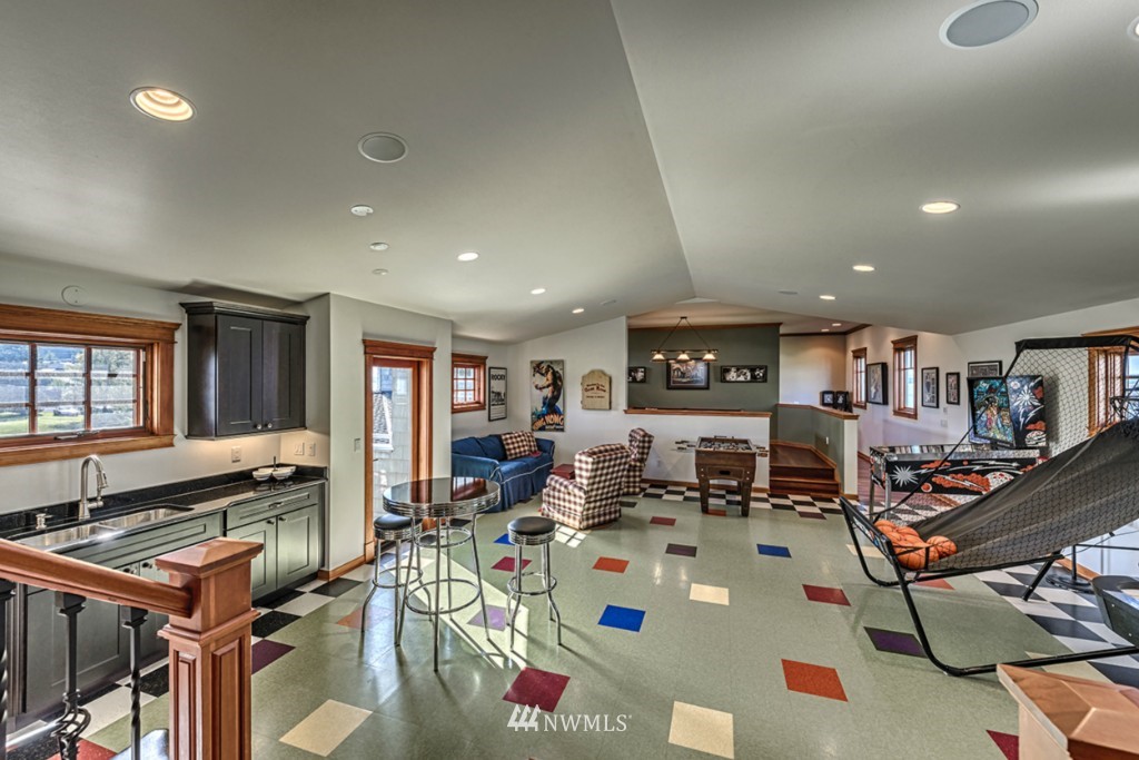 9690 Samish Island Road Bow, WA 98232 - Photo 21 of 25 a living room with lots of furniture and white walls