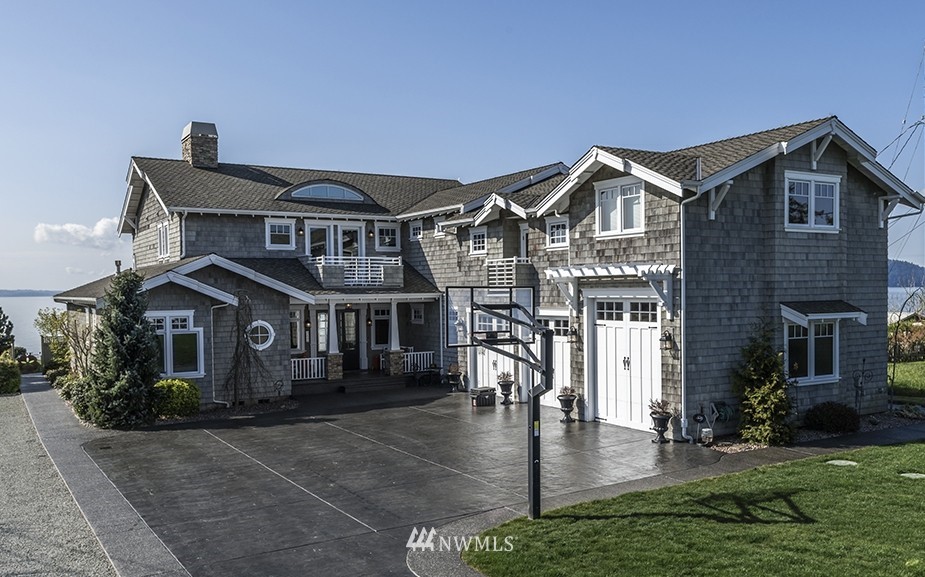 9690 Samish Island Road Bow, WA 98232 - Photo 24 of 25 a front view of a house with a yard
