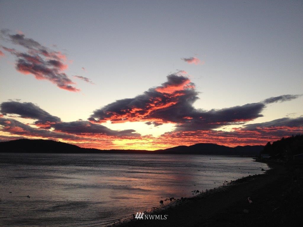 9690 Samish Island Road Bow, WA 98232 - Photo 25 of 25 a view of mountain with sunset