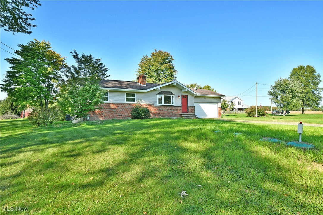 4461 Ridge Road Cortland, OH 44410 - Photo 44 of 47 Ranch-style house with a front yard