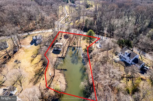 an aerial view of houses with outdoor space