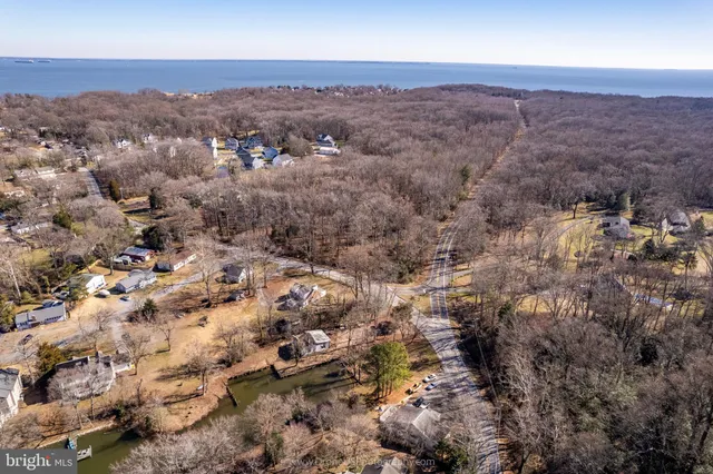 a view of a yard covered with snow