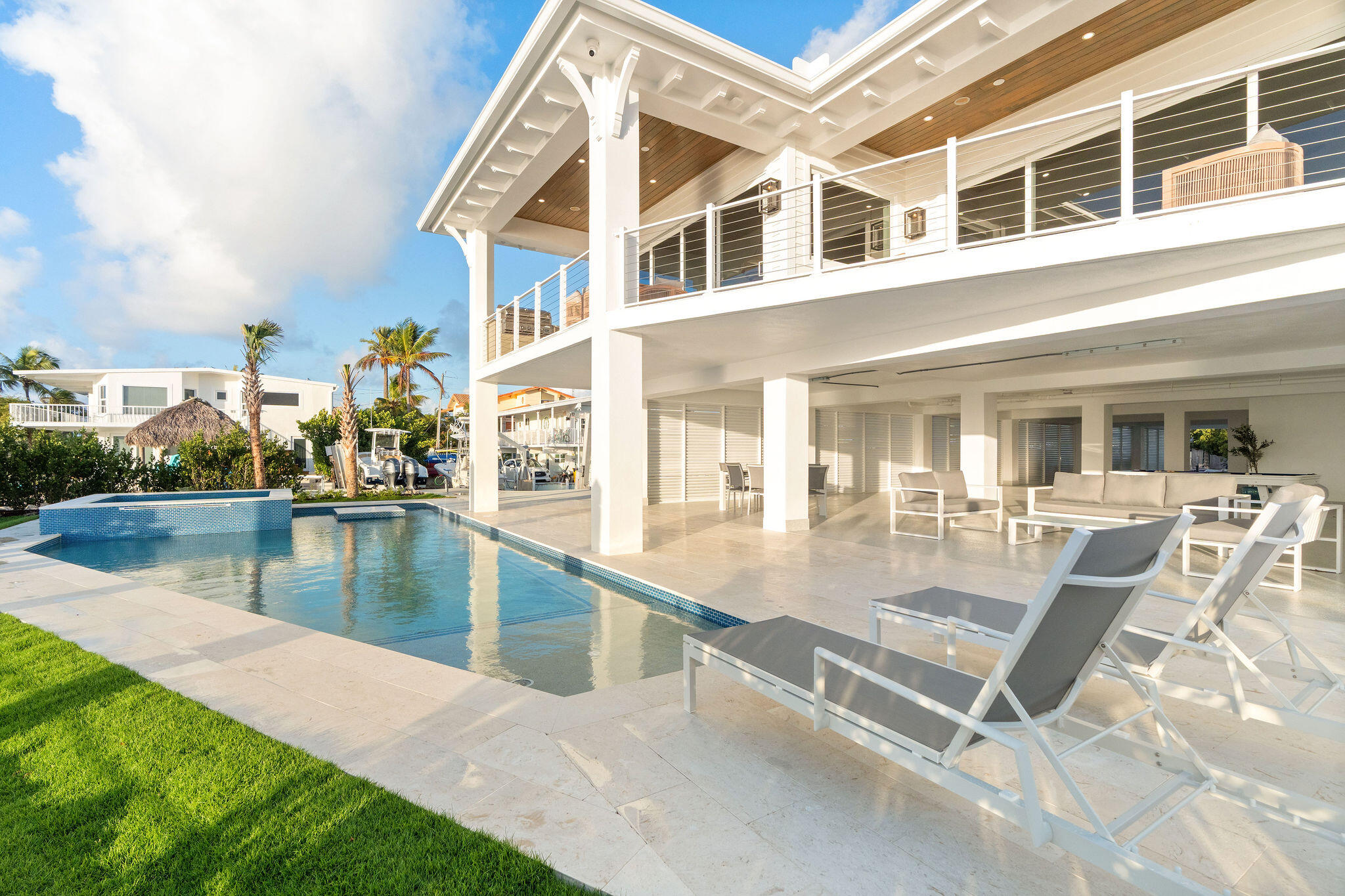 1002 Snapper Lane Key Largo, FL 33037 - Photo 72 of 106 a view of a house with swimming pool and sitting area