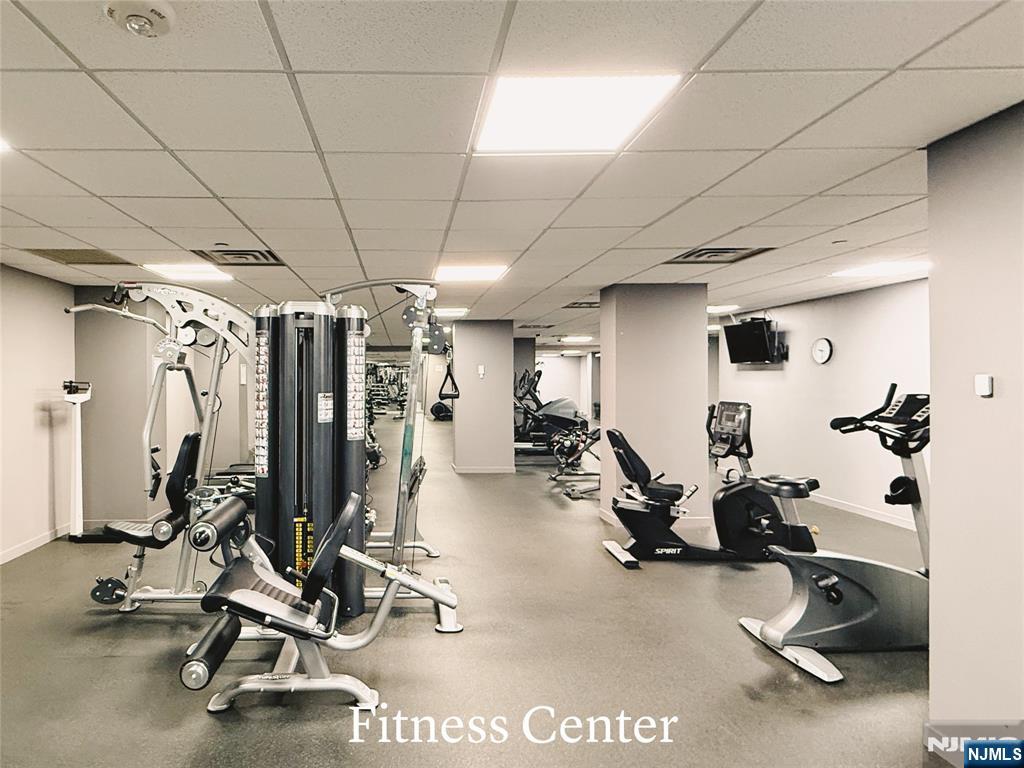 1265 15th Street, Unit 1A Fort Lee, NJ 07024 - Photo 14 of 14 a view of a room with gym equipment