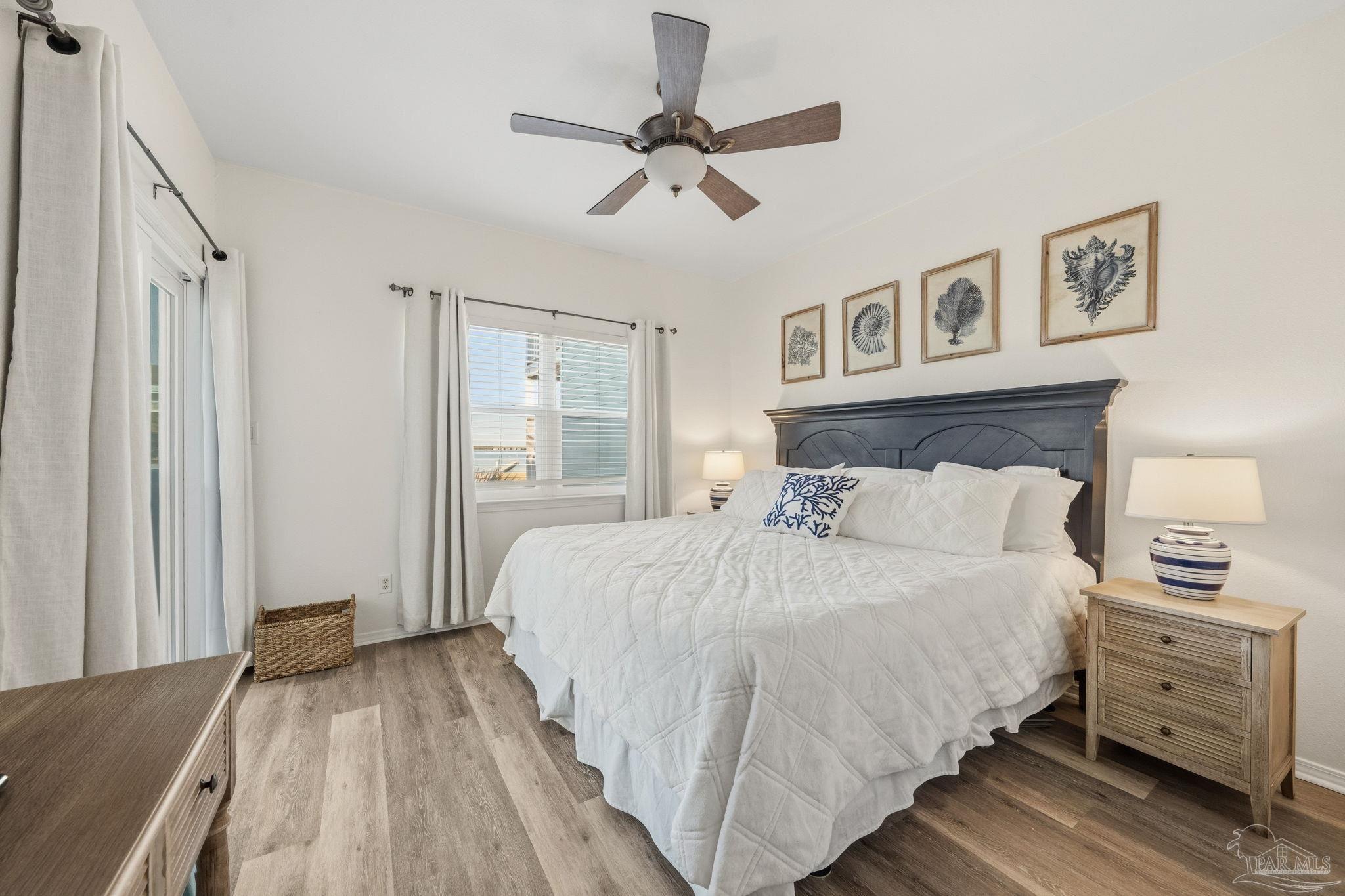 1150 Fort Pickens Road, Unit A3 Pensacola Beach, FL 32561 - Photo 14 of 36 a bedroom with a bed and a window