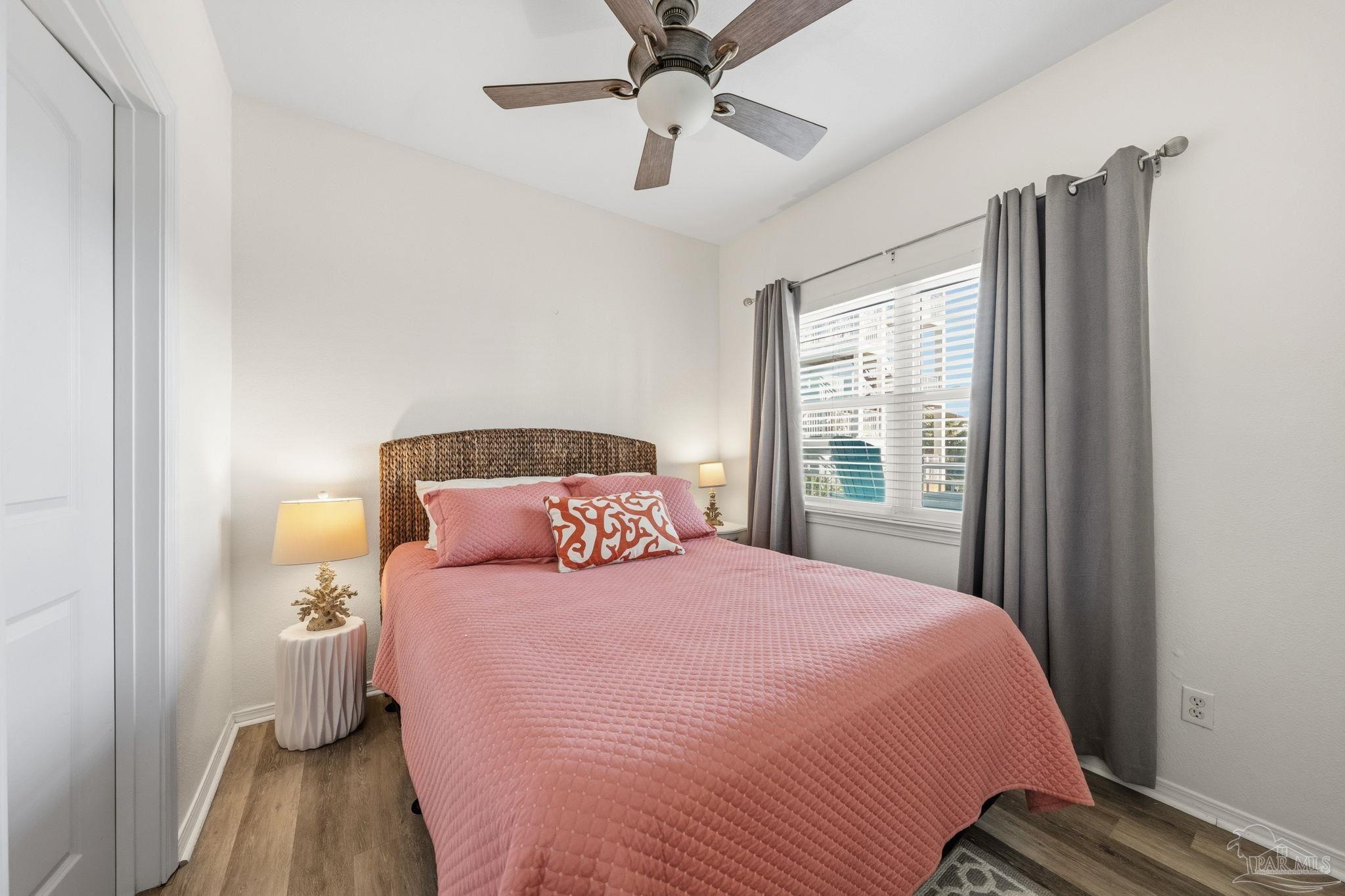 1150 Fort Pickens Road, Unit A3 Pensacola Beach, FL 32561 - Photo 18 of 36 a bedroom with a bed and window