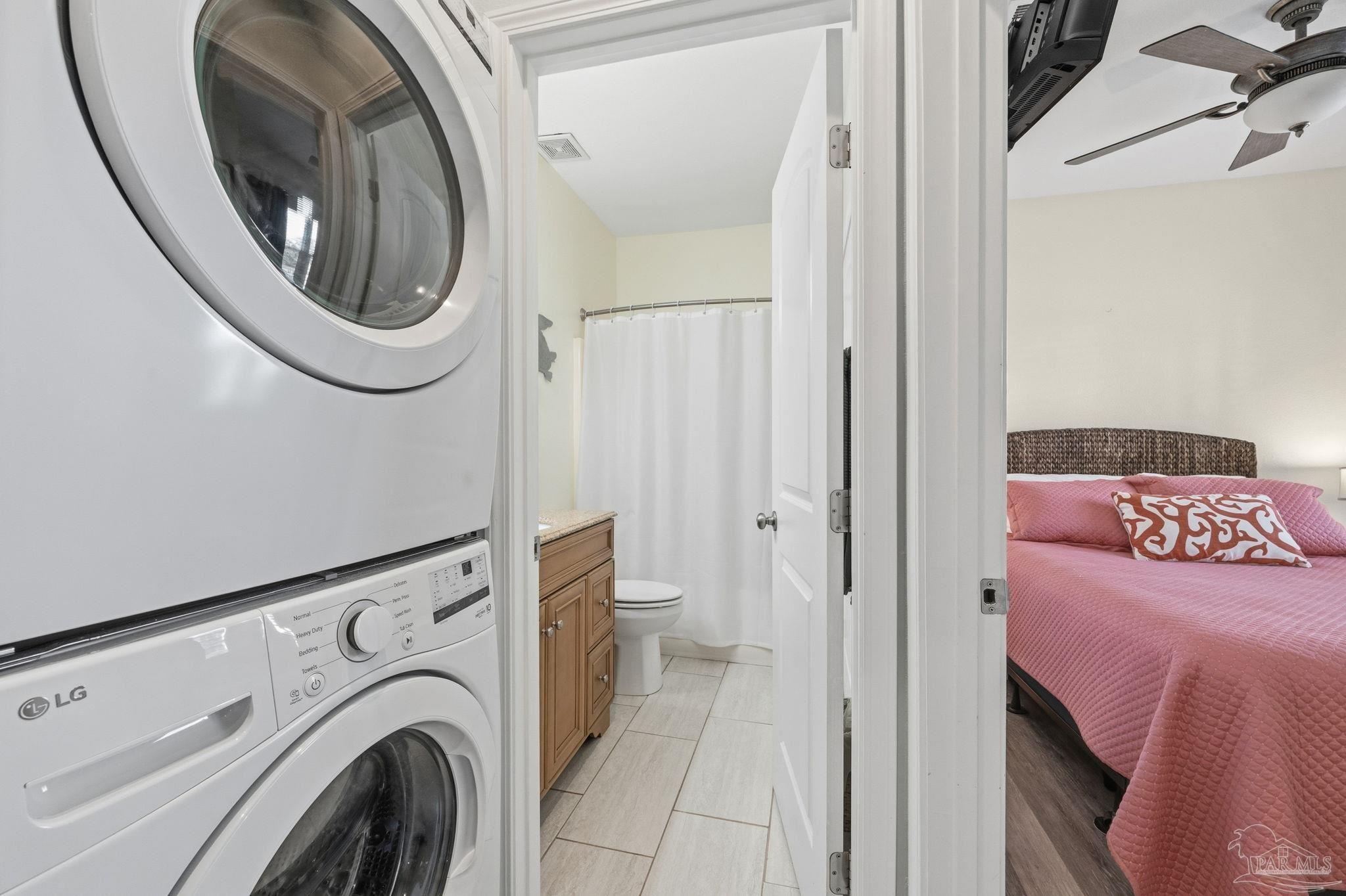 1150 Fort Pickens Road, Unit A3 Pensacola Beach, FL 32561 - Photo 20 of 36 a utility room with dryer and washer