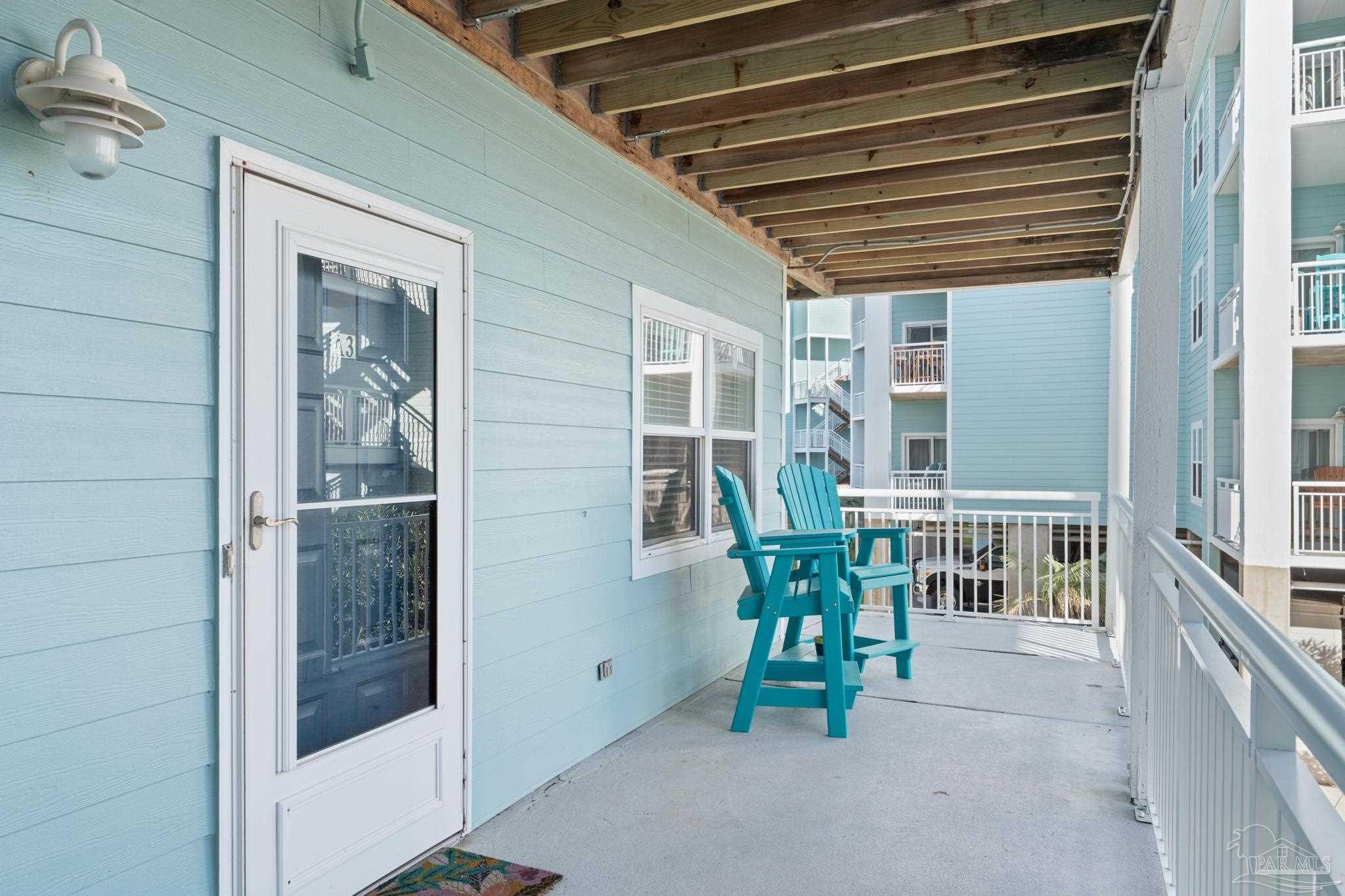 1150 Fort Pickens Road, Unit A3 Pensacola Beach, FL 32561 - Photo 5 of 36 a view of balcony with seating space