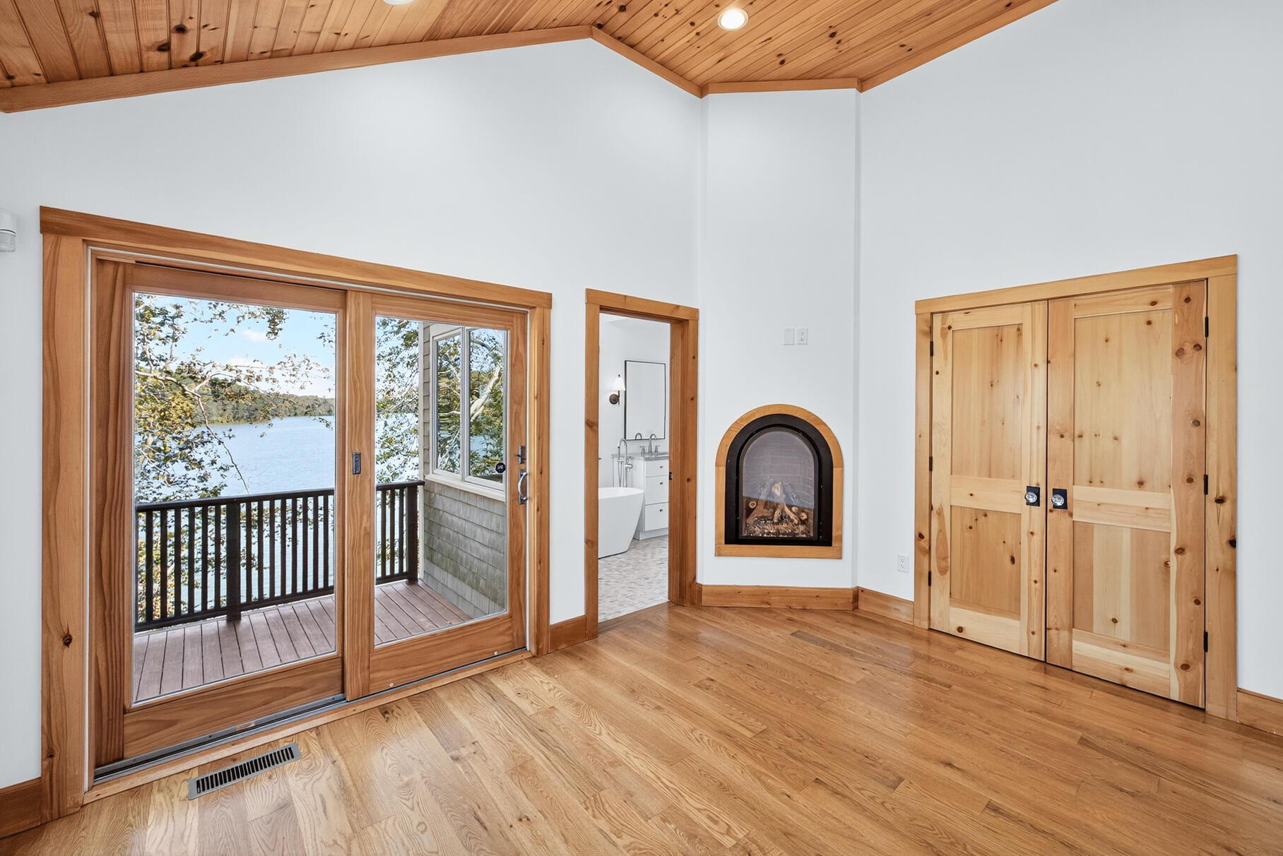 131 Timberlane Drive Mashpee, MA 02649 - Photo 32 of 57 a view of a bedroom with wooden floor and large window
