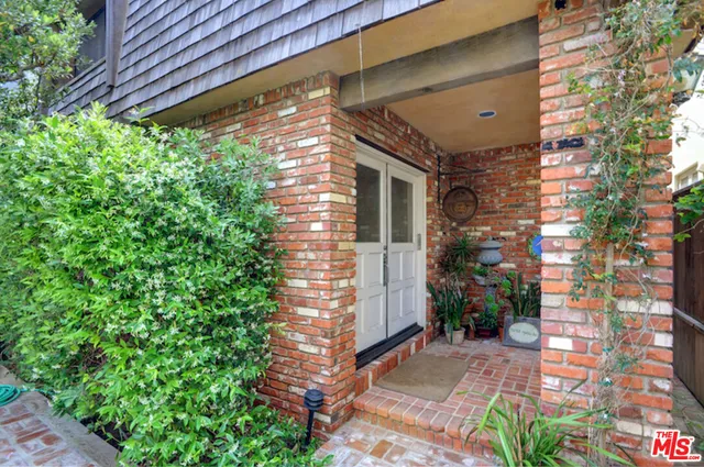 a view of a door and an outdoor space