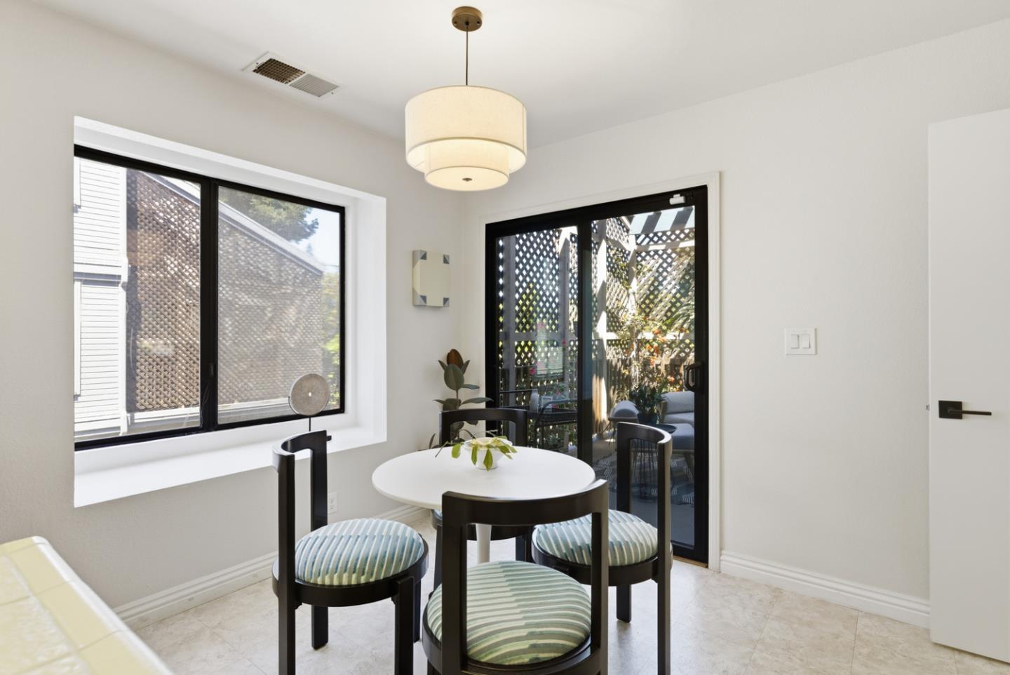 1669 Geary Road Walnut Creek, CA 94597 - Photo 17 of 39 a view of a room with a table and chairs
