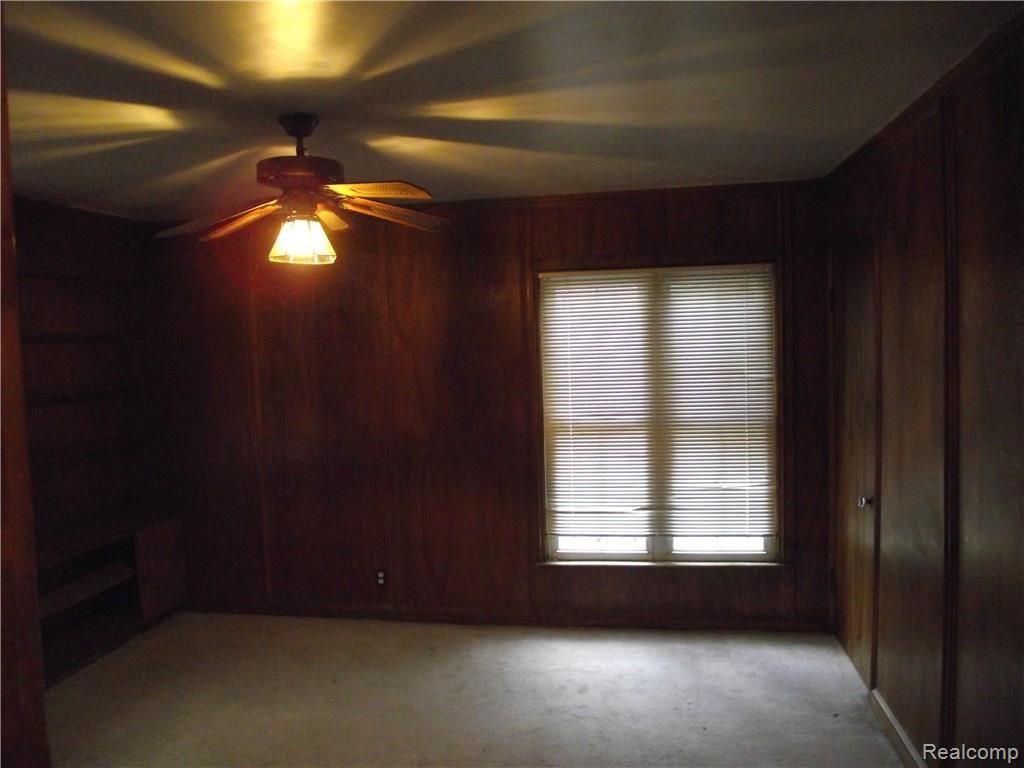 14256 Rutland Street Detroit, MI 48227 - Photo 14 of 27 1ST FLOOR BEDROOM WITH BUILT-IN SHELVES