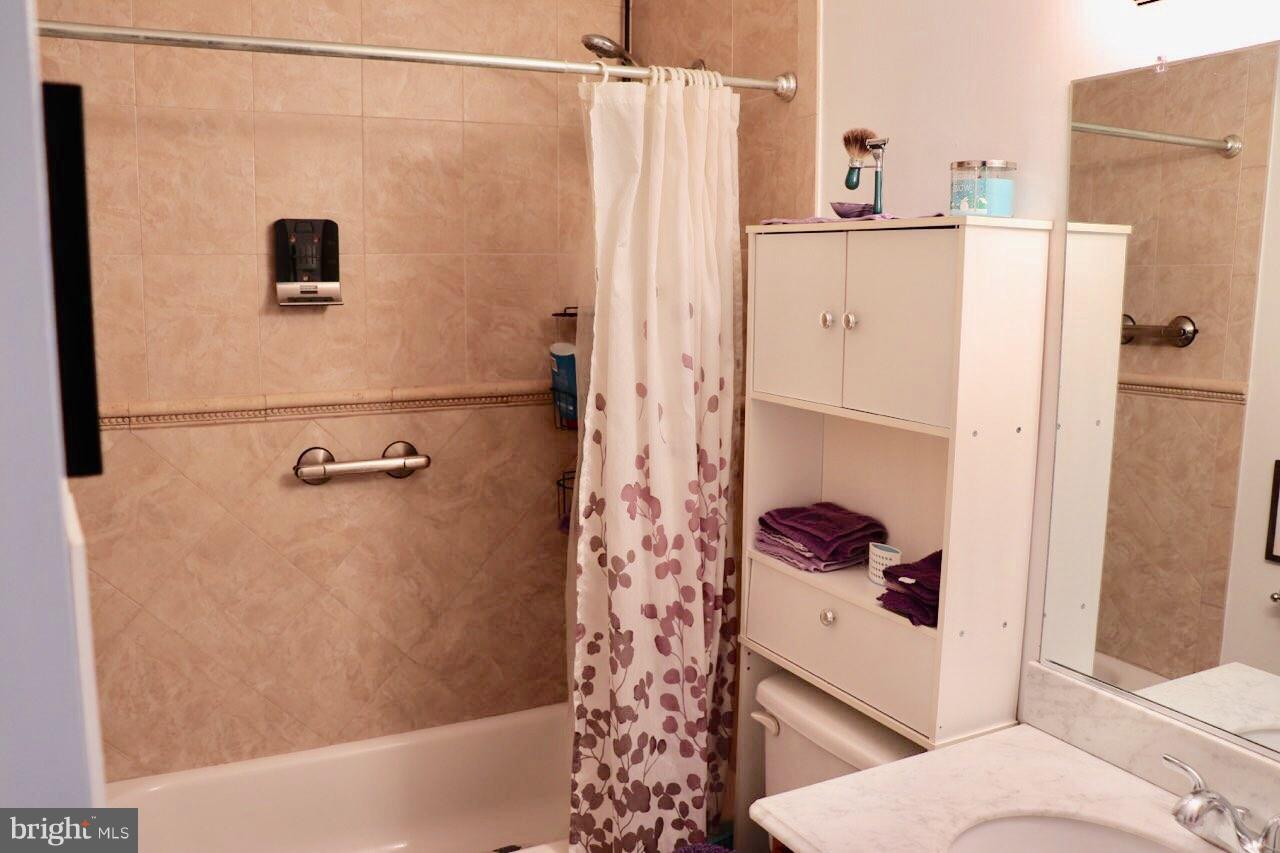 23816 McIntosh Road Hollywood, MD 20636 - Photo 11 of 18 hall bath with ceramic tile