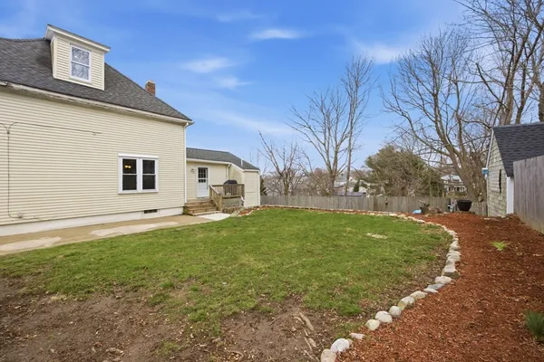 a view of backyard of house