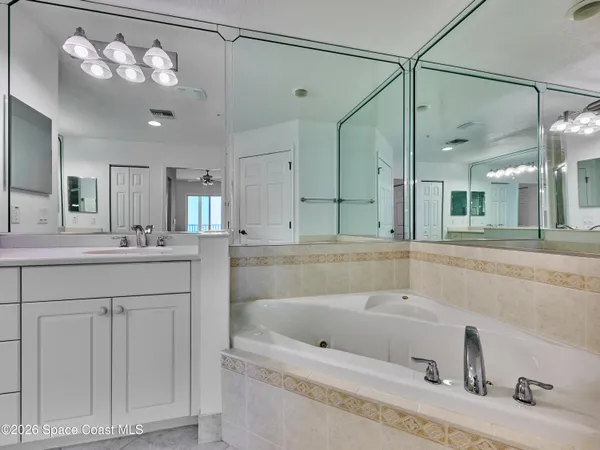 a view of an ocean and a mountain