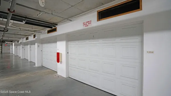 a hallway with wooden door