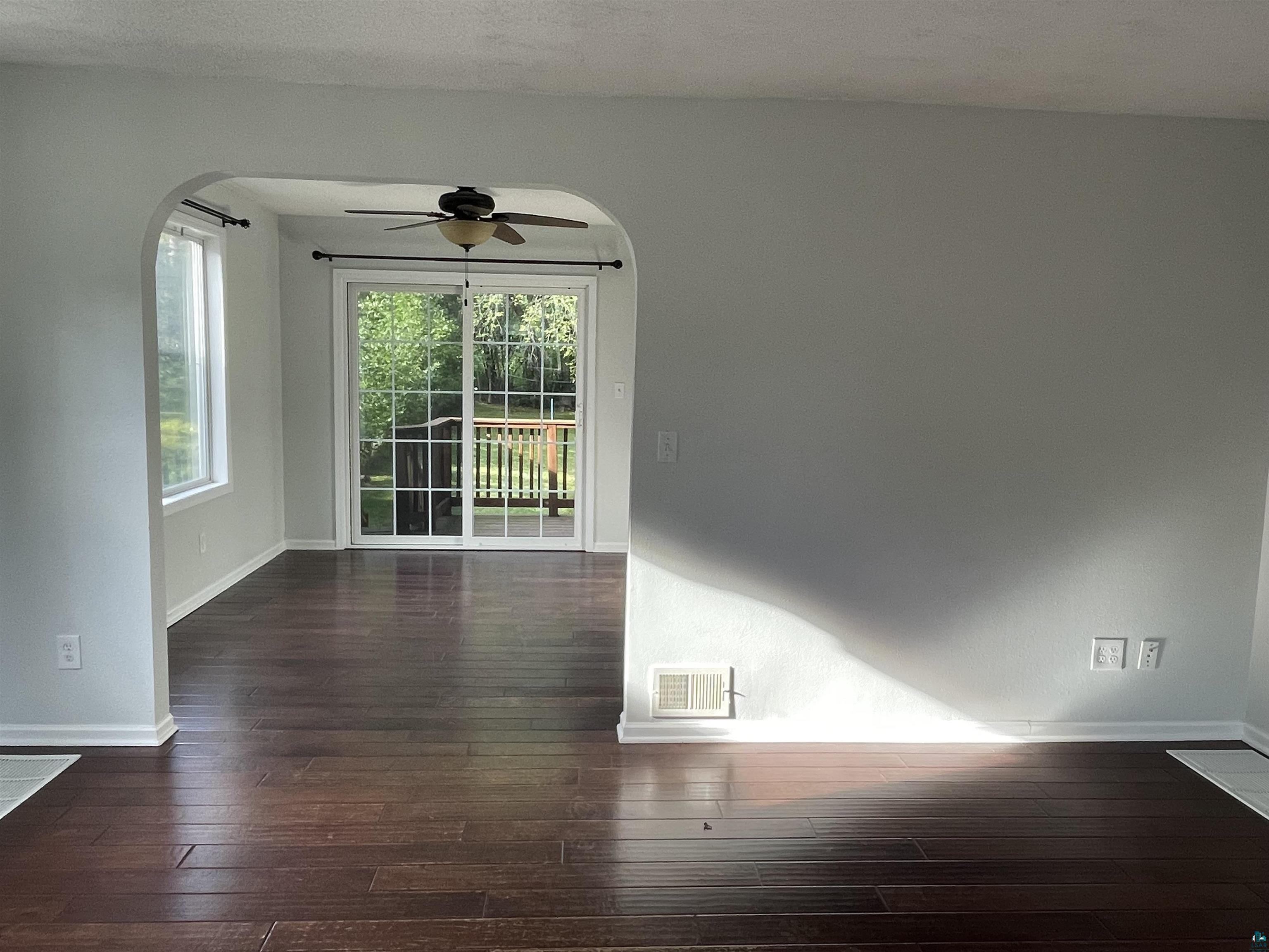 4315 Pitt Street Duluth, MN 55804 - Photo 8 of 27 Spare room featuring plenty of natural light and dark hardwood / wood-style flooring