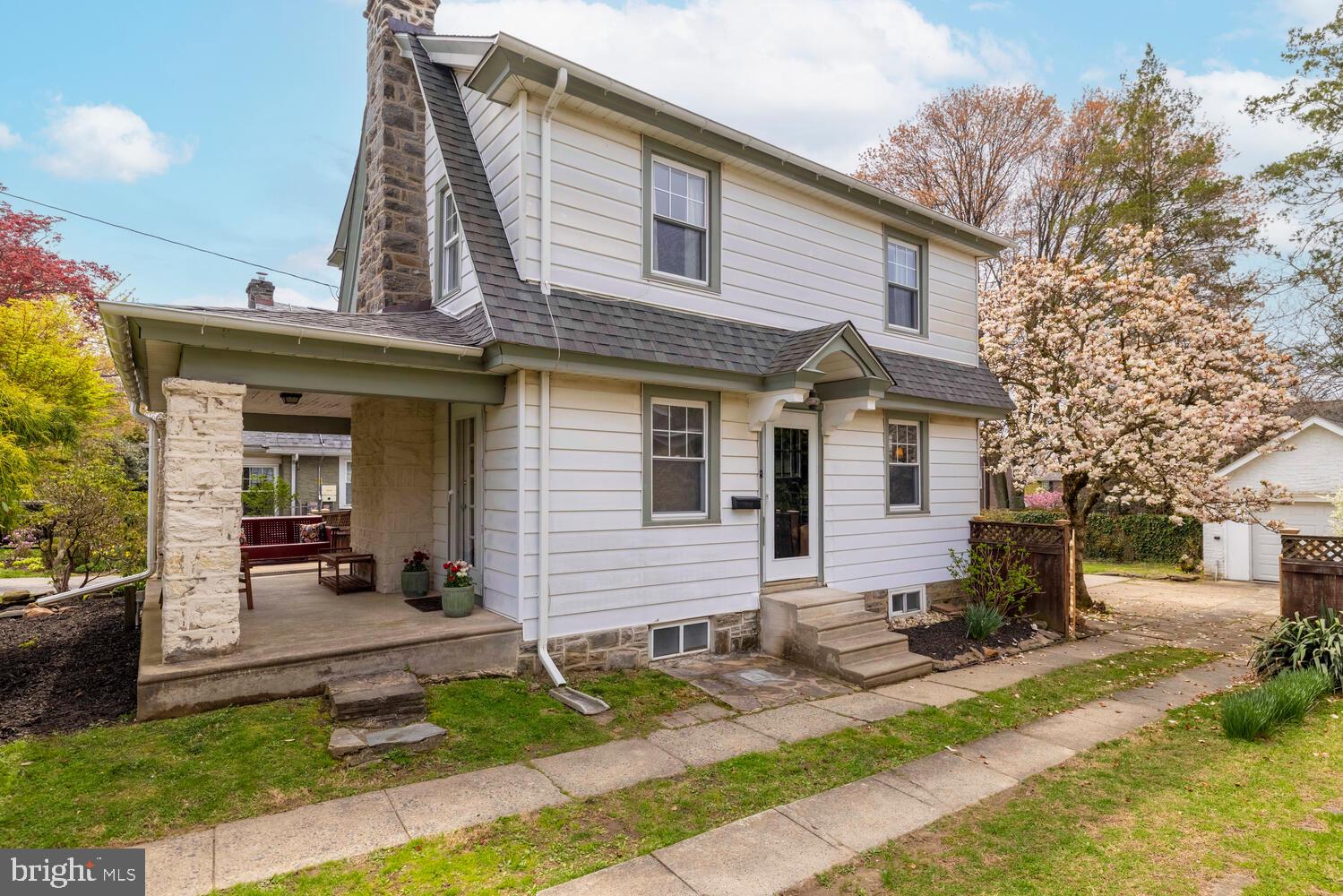 2116 East County Line Road Ardmore, PA 19003 - Photo 38 of 38 a view of a house with a patio