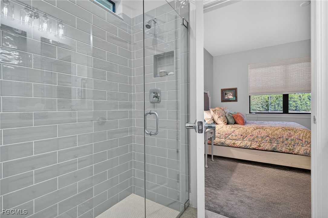 11268 Carlingford Road Fort Myers, FL 33913 - Photo 20 of 48 a bedroom with a bed and a window