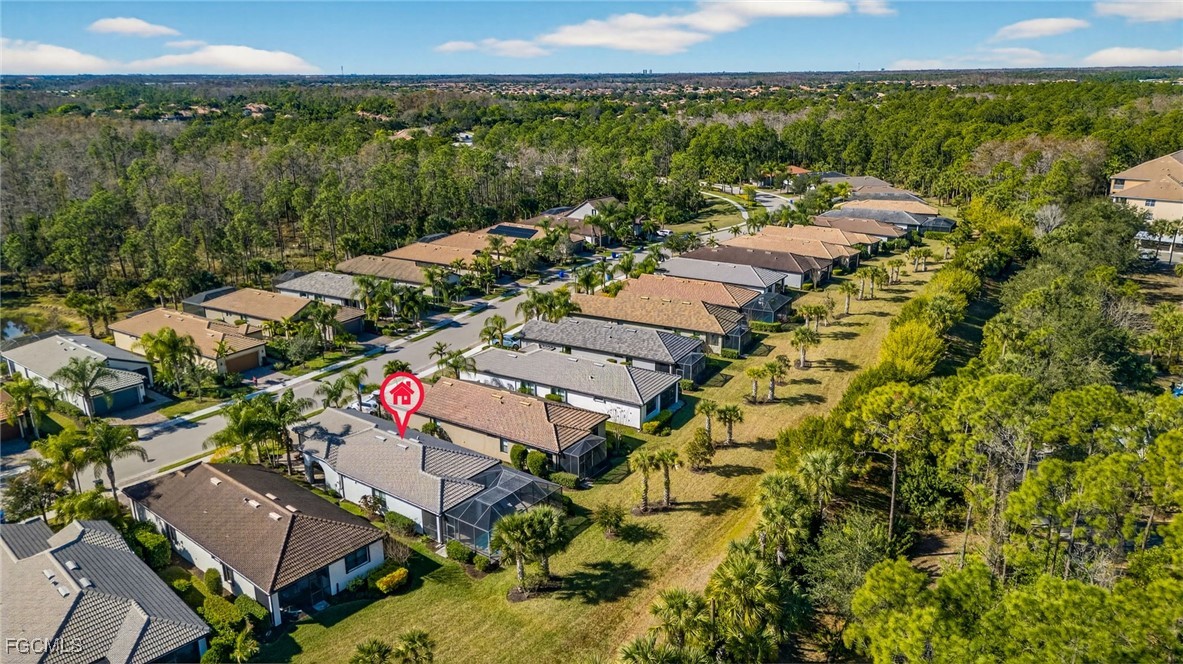 11268 Carlingford Road Fort Myers, FL 33913 - Photo 35 of 48 an aerial view of residential houses with outdoor space and trees