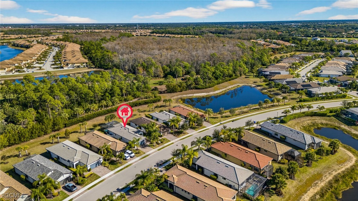 11268 Carlingford Road Fort Myers, FL 33913 - Photo 38 of 48 an aerial view of a house with a lake