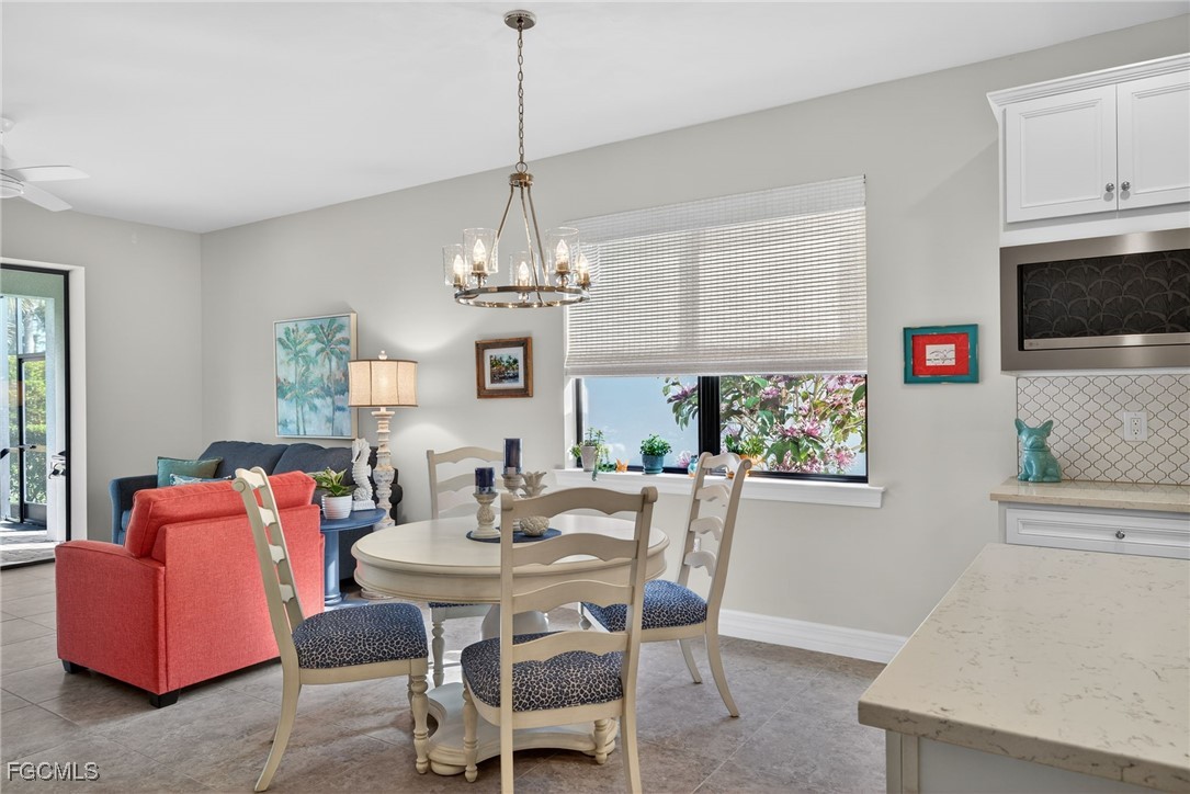 11268 Carlingford Road Fort Myers, FL 33913 - Photo 10 of 48 a view of a dining room with furniture