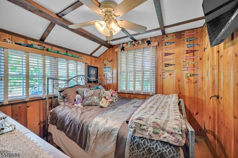 134 Birch Road Vernon, NJ 07422 - Photo 12 of 49 a bedroom with a bed and a window