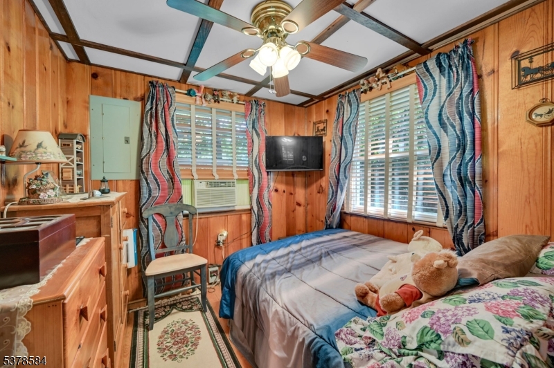 134 Birch Road Vernon, NJ 07422 - Photo 13 of 49 a bedroom with bed and a window