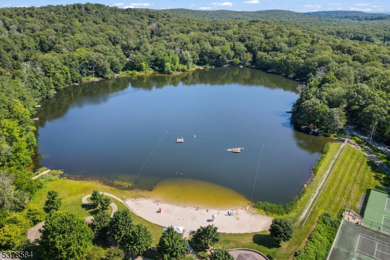 134 Birch Road Vernon, NJ 07422 - Photo 14 of 49 an aerial view of lake residential house with swimming pool and green space