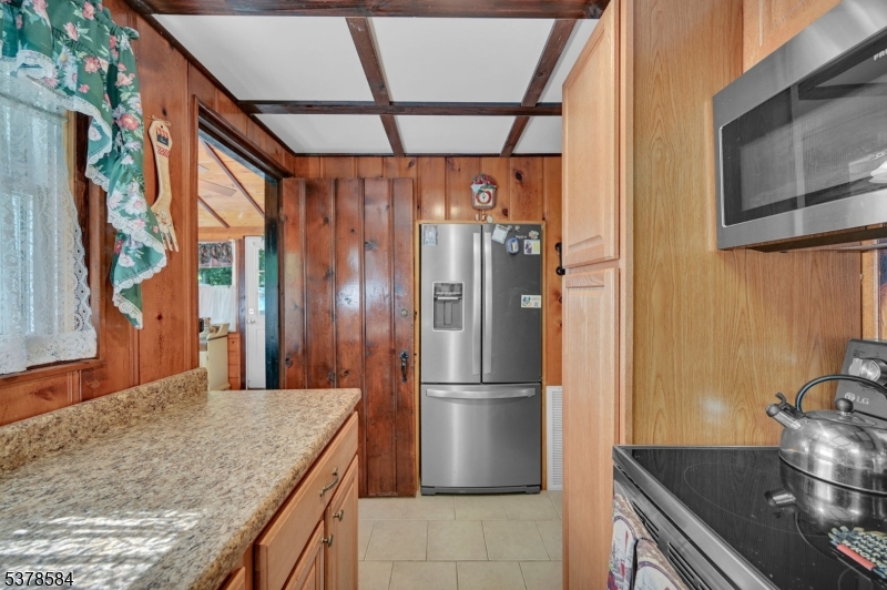 134 Birch Road Vernon, NJ 07422 - Photo 20 of 49 a kitchen with stainless steel appliances granite countertop a refrigerator and a sink