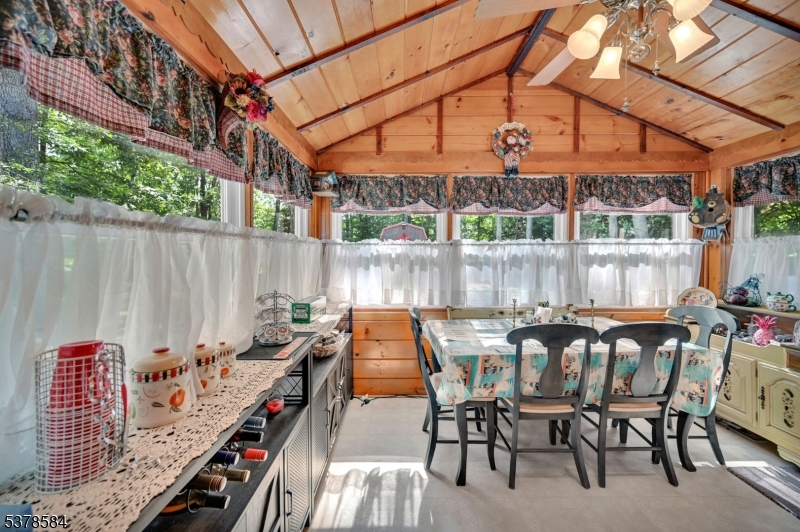 134 Birch Road Vernon, NJ 07422 - Photo 23 of 49 a view of a patio with table and chairs