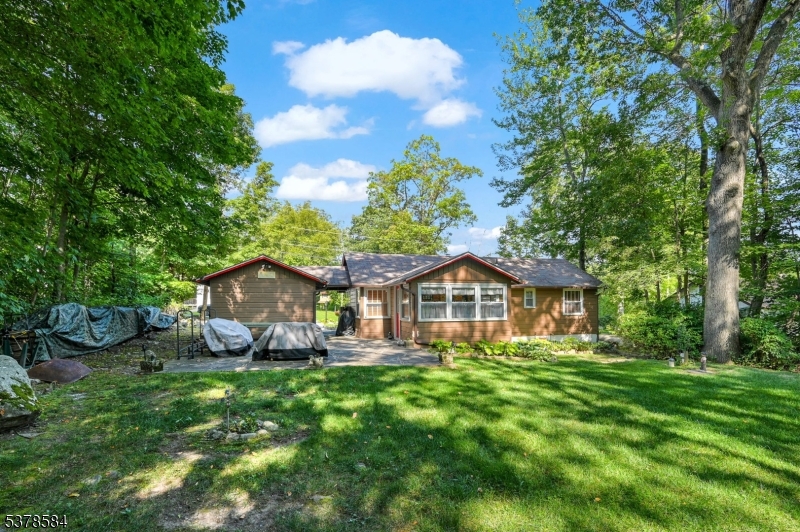 134 Birch Road Vernon, NJ 07422 - Photo 30 of 49 a front view of a house with garden