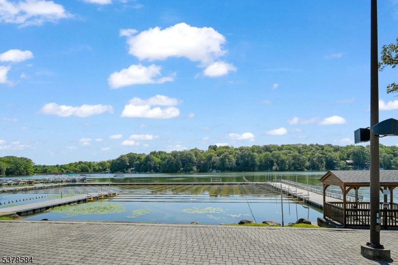 134 Birch Road Vernon, NJ 07422 - Photo 37 of 49 a view of a swimming pool with a lake view