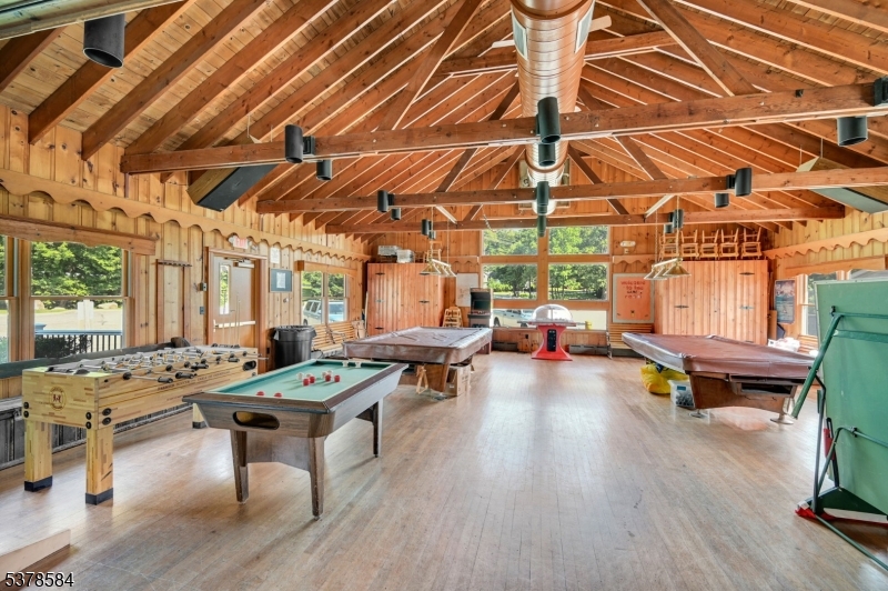 134 Birch Road Vernon, NJ 07422 - Photo 39 of 49 a outdoor space with lots of furniture and wooden floor