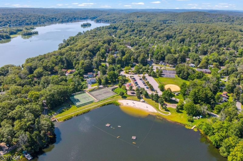 134 Birch Road Vernon, NJ 07422 - Photo 49 of 49 a view of a lake with a mountain