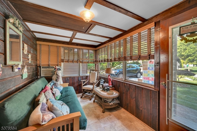 134 Birch Road Vernon, NJ 07422 - Photo 5 of 49 a room with furniture and a large window